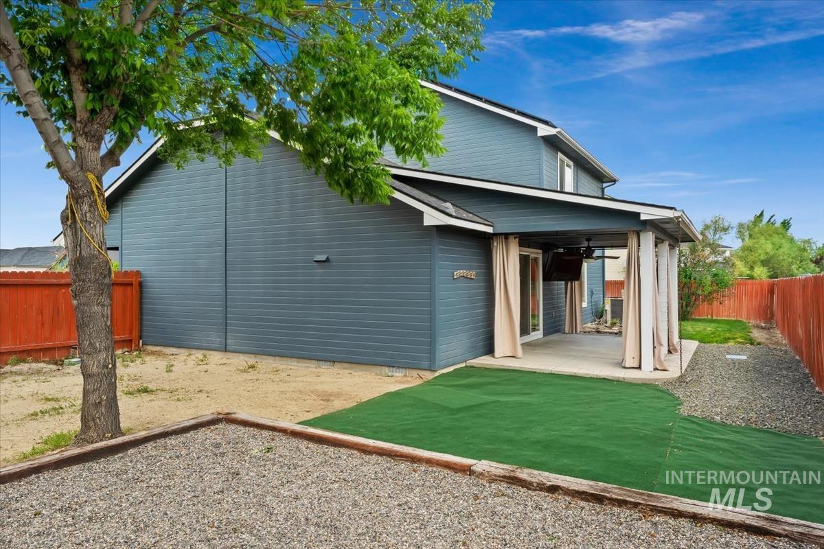 80 Cobblestone Court Middleton, ID 83644 - Photo 36 of 48 Covered patio with a concrete slab, recessed lighting, and an outdoor ceiling fan