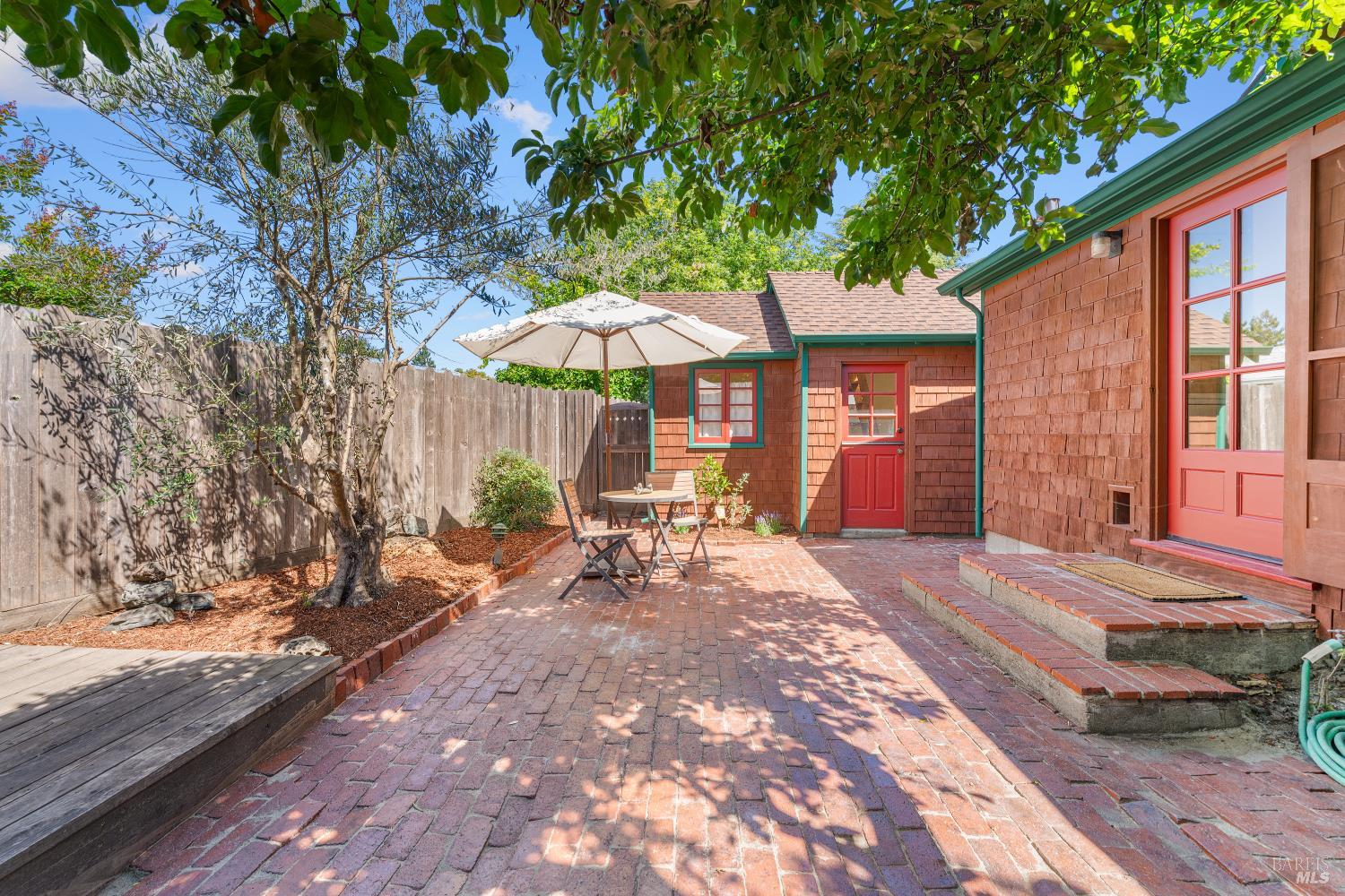 309 Hendley Street Santa Rosa, CA 95404 - Photo 13 of 31 a view of a house with backyard and sitting area