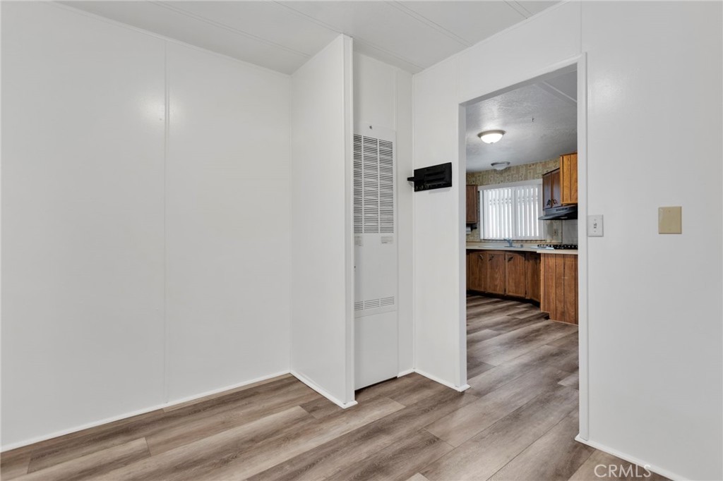 15252 Seneca Road, Unit 241 Victorville, CA 92392 - Photo 24 of 30 a view of kitchen with wooden floor