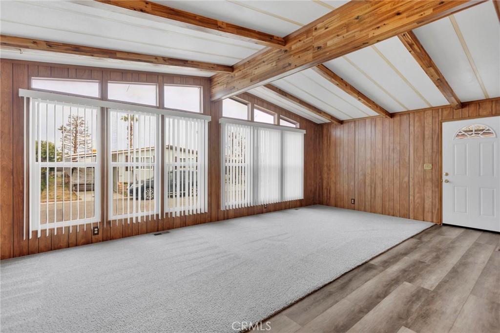 15252 Seneca Road, Unit 241 Victorville, CA 92392 - Photo 6 of 30 a view of an empty room with a balcony