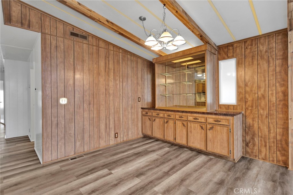 15252 Seneca Road, Unit 241 Victorville, CA 92392 - Photo 9 of 30 a spacious bathroom with a granite countertop sink a mirror and a shower