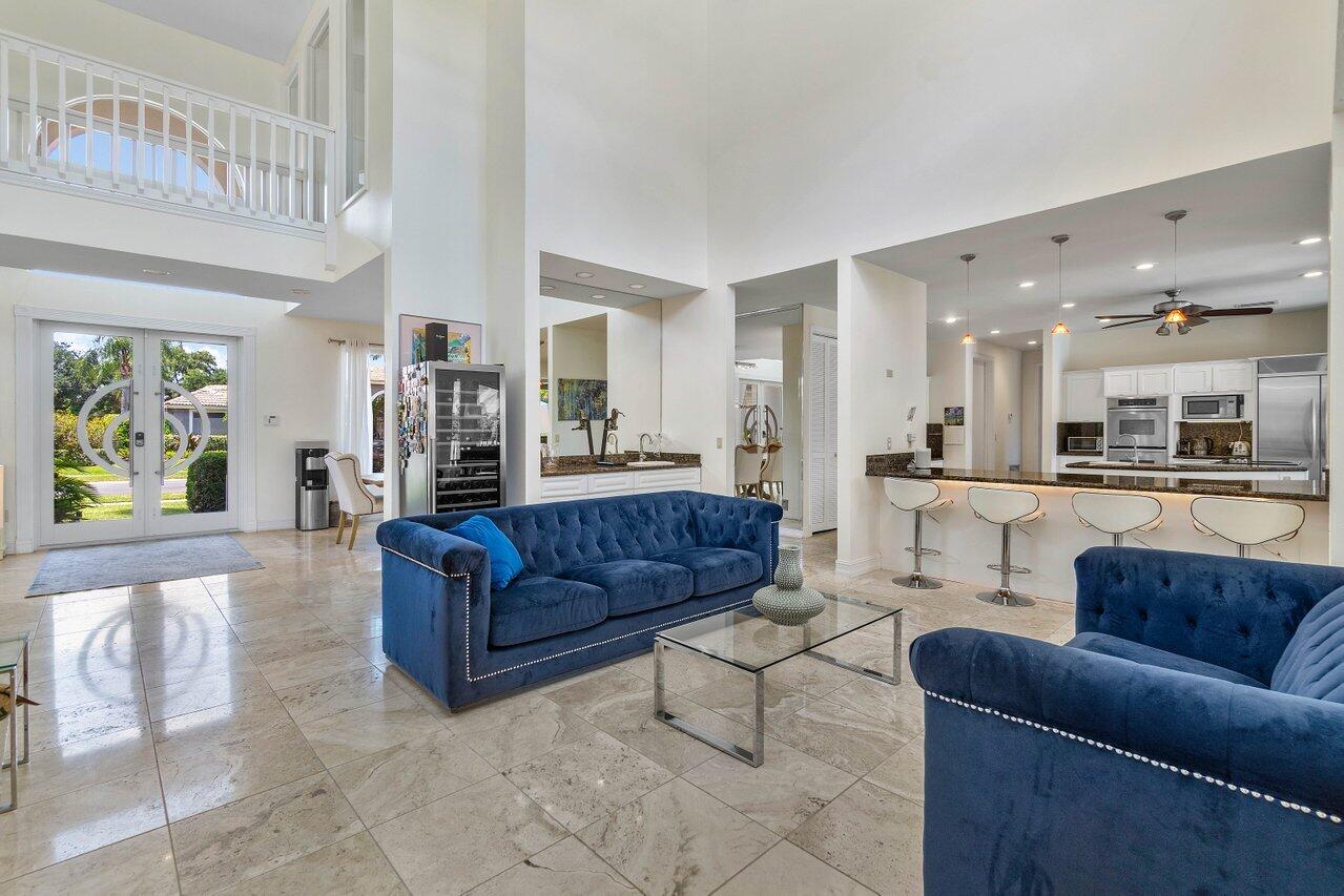 7939 Mandarin Drive Boca Raton, FL 33433 - Photo 11 of 51 living room with fireplace