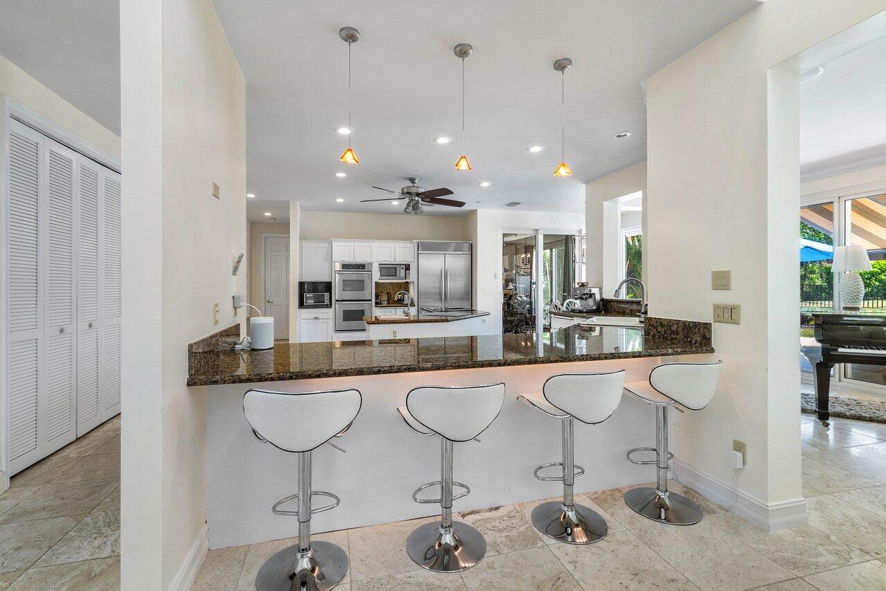 7939 Mandarin Drive Boca Raton, FL 33433 - Photo 13 of 51 kitchen island