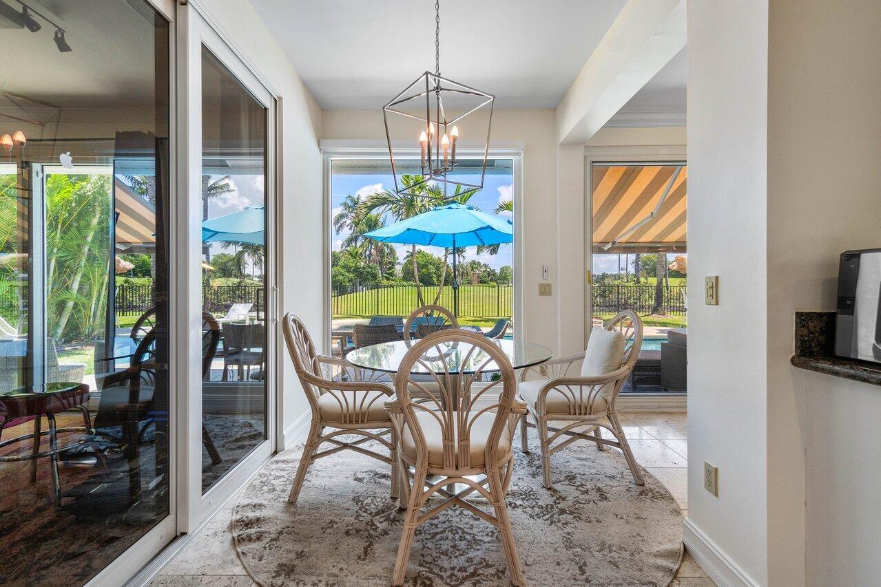 7939 Mandarin Drive Boca Raton, FL 33433 - Photo 15 of 51 Kitchen table and golf view