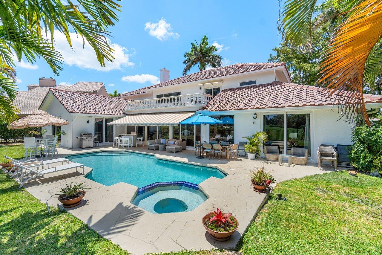 7939 Mandarin Drive Boca Raton, FL 33433 - Photo 9 of 51 pool and backyard