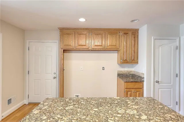 a view of livingroom with kitchen