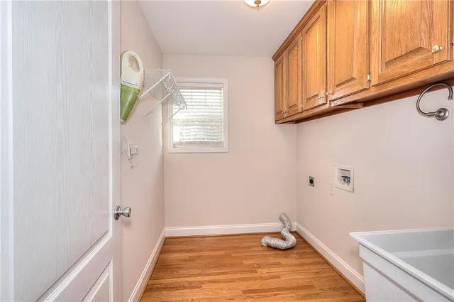 a bathroom with a sink and a window