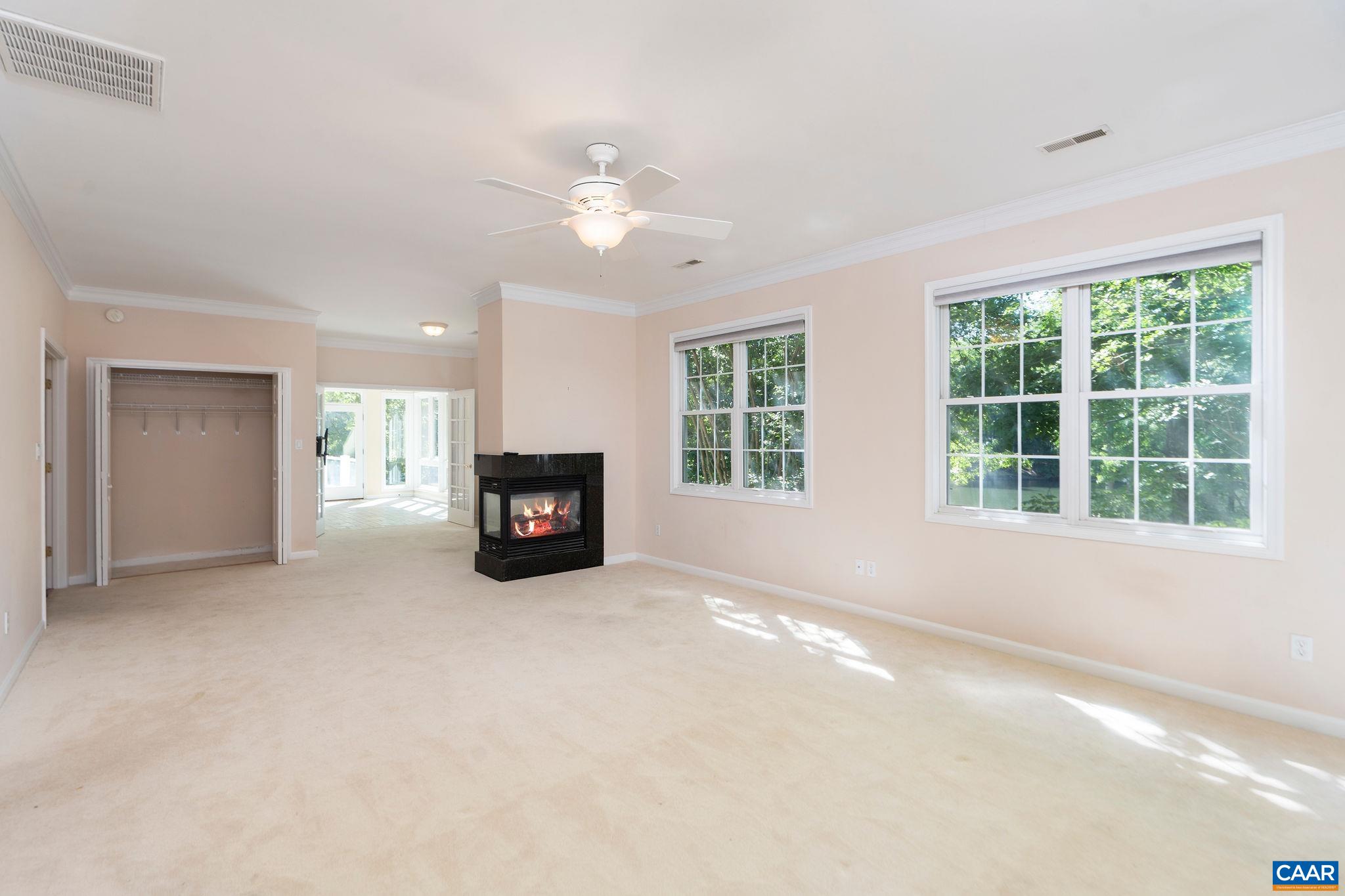 21 Amethyst Road Palmyra, VA 22963 - Photo 24 of 66 a living room with furniture and a large window