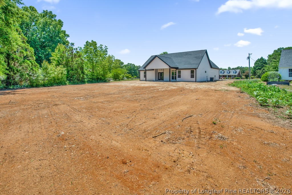 3025 Old Stage Road South Erwin, NC 28339 - Photo 43 of 50 a front view of a house with a yard