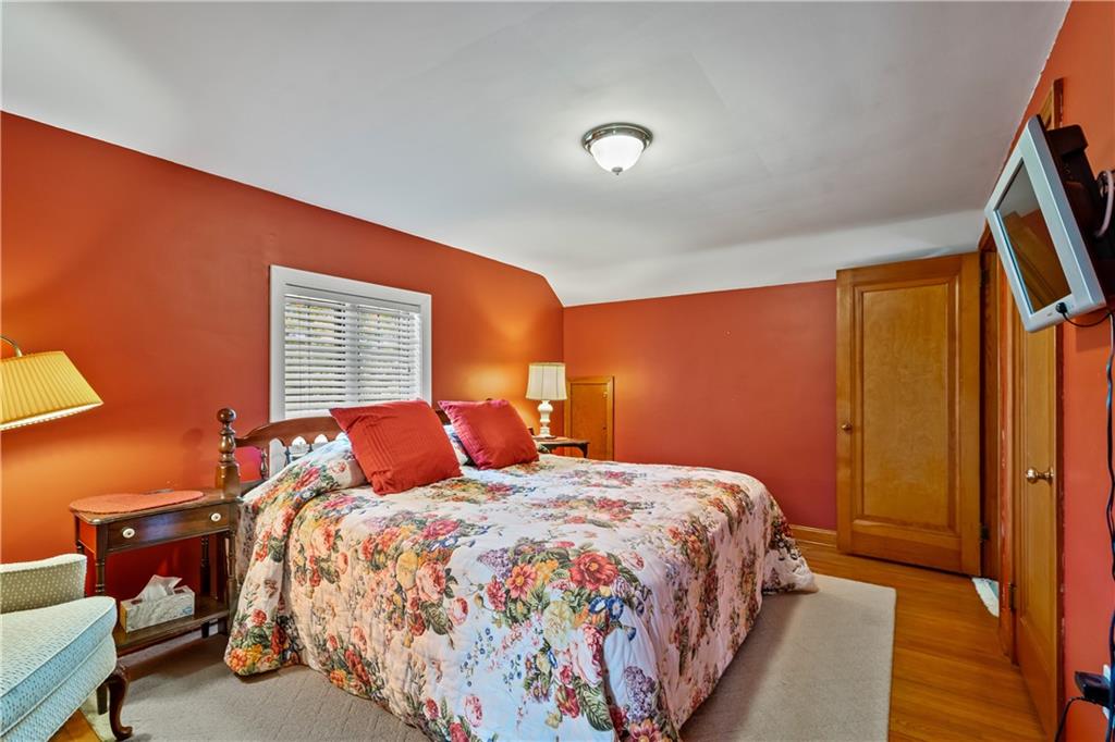 801 Spring Street Latrobe, PA 15650 - Photo 15 of 25 a bedroom with a bed and a window