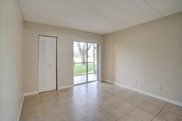 a view of a room with white doors