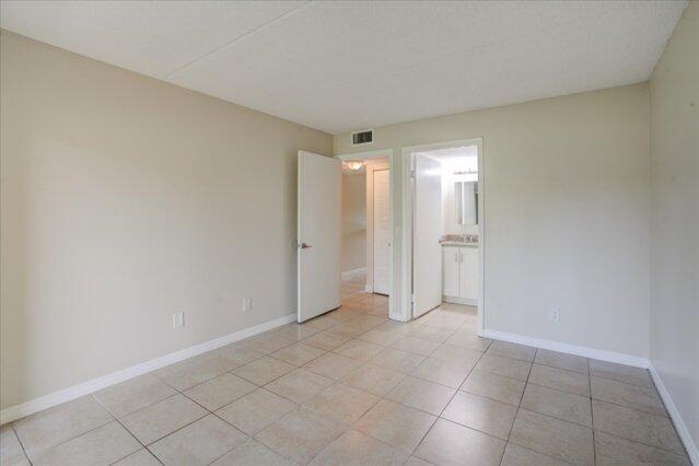 1104 Meadows Circle, Unit 1104 Boynton Beach, FL 33436 - Photo 21 of 27 a view of an empty room