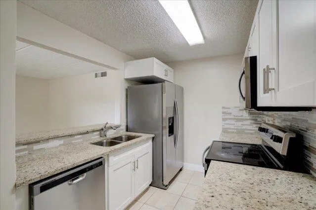 a cars parked in front of a building