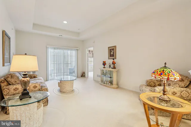 a front view of a building with parking space