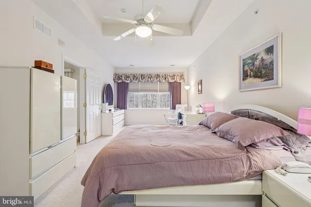 a view of a swimming pool with an outdoor space and seating area