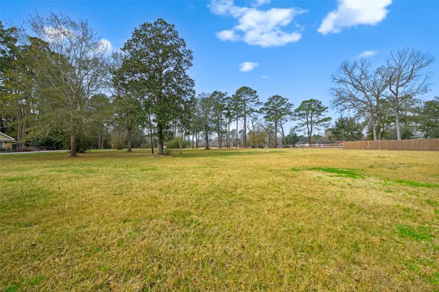 a view of swimming pool with an outdoor space and seating area