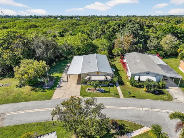 an aerial view of a house with a garden