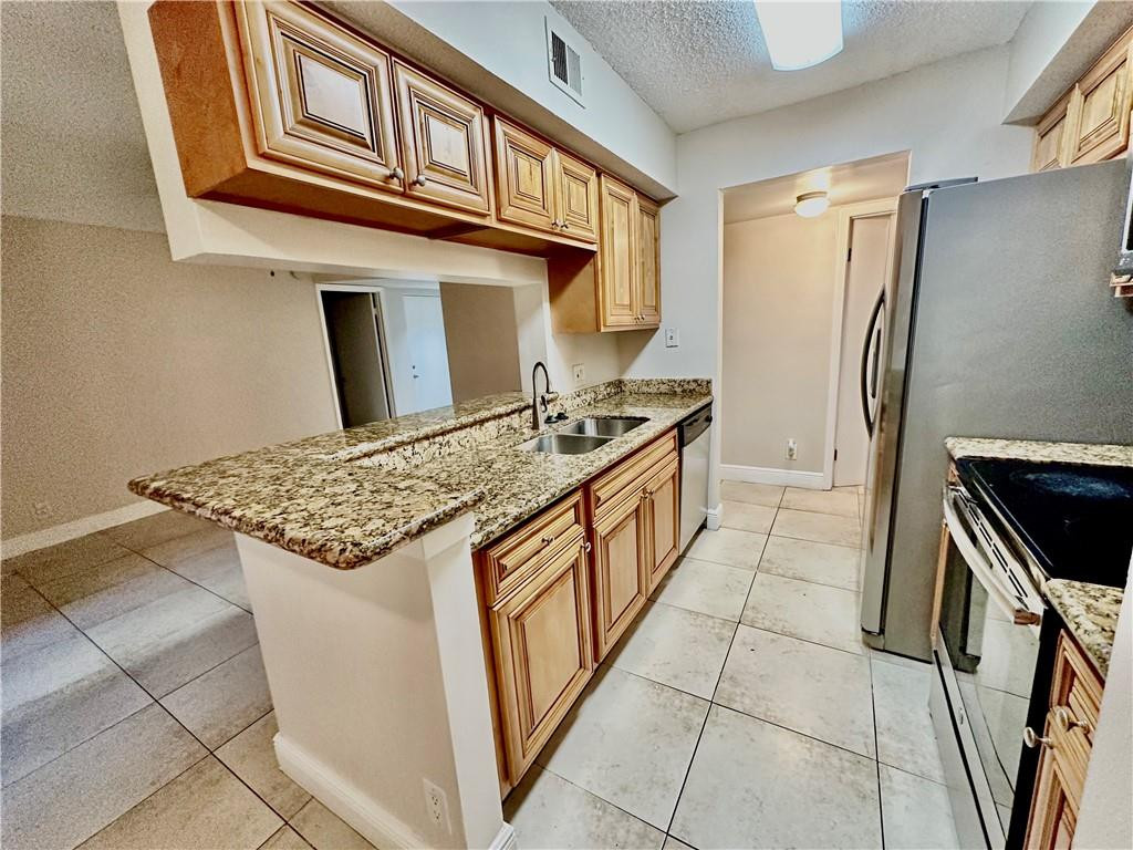 5686 Rock Island Road, Unit 103 Tamarac, FL 33319 - Photo 2 of 12 Photo 2
