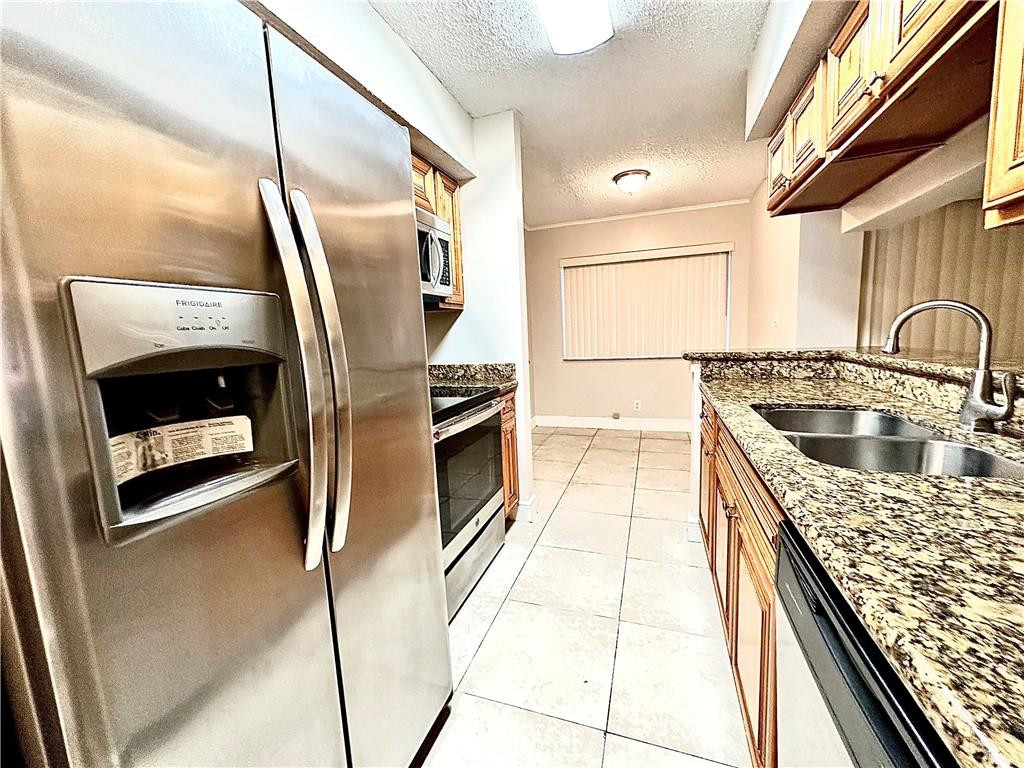 5686 Rock Island Road, Unit 103 Tamarac, FL 33319 - Photo 3 of 12 Photo 3