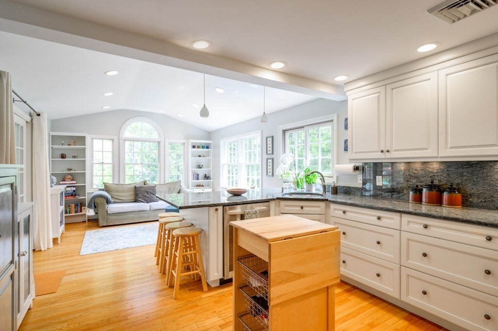 7 Carlton Road Marblehead, MA 01945 - Photo 2 of 42 a large kitchen with stainless steel appliances lots of counter space and windows