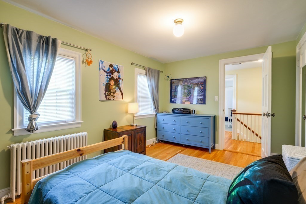 7 Carlton Road Marblehead, MA 01945 - Photo 27 of 42 a view of a bedroom with furniture window and wooden floor