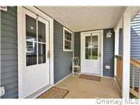a view of house with front door