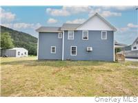 162 Rockland Road Roscoe, NY 12776 - Photo 35 of 36 a view of an house with backyard space
