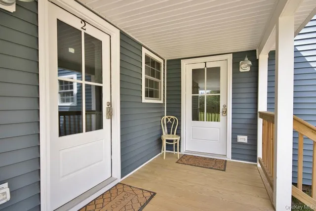 a view of front door and porch