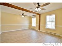 162 Rockland Road Roscoe, NY 12776 - Photo 9 of 36 a view of an empty room with a window