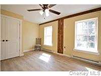 162 Rockland Road Roscoe, NY 12776 - Photo 10 of 36 a view of an empty room with a window