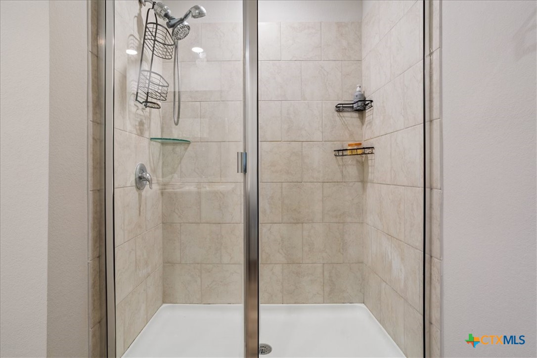1000 Velvet Court Troy, TX 76579 - Photo 17 of 25 a bathroom with a shower