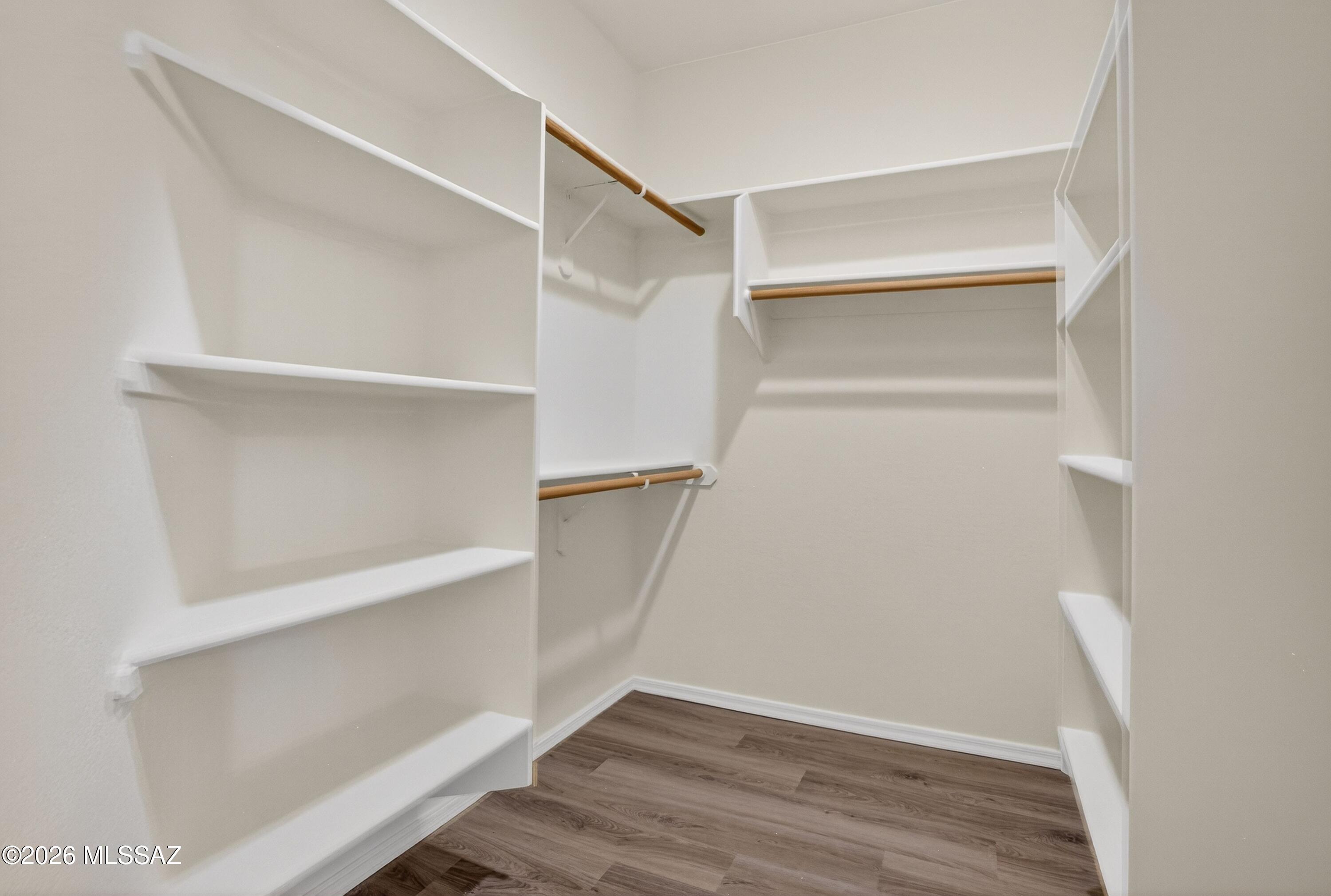 2550 East River Road, Unit 4204 Tucson, AZ 85718 - Photo 22 of 36 a view of an empty walk in closet