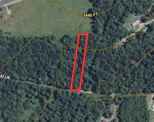 a view of a house with a park