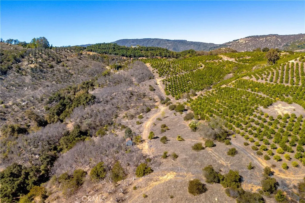 34 Los Gatos Road Temecula, CA 92590 - Photo 4 of 12 a view of a field with mountains in the background