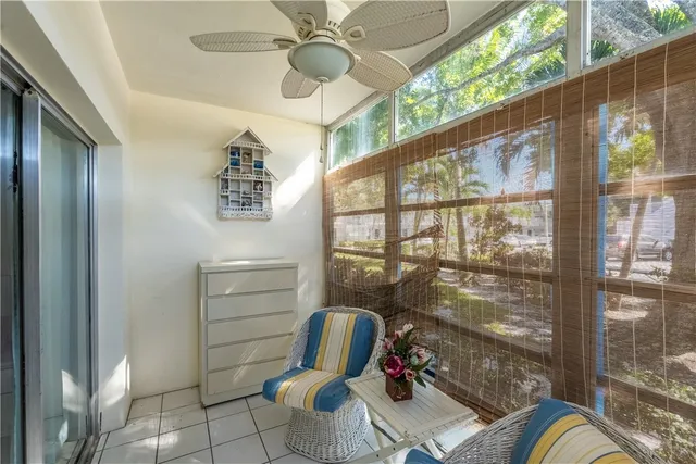 a room with furniture and a window