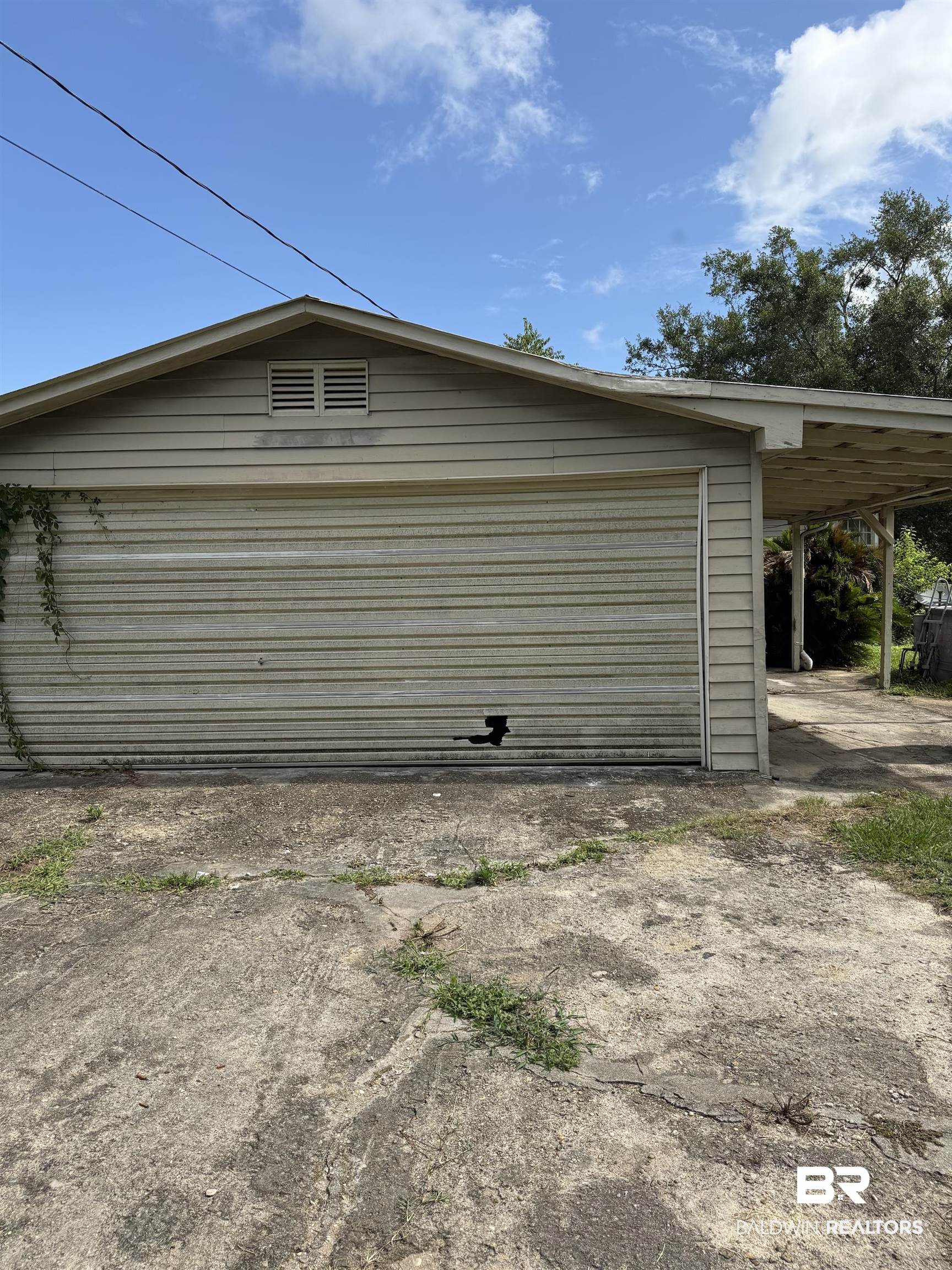 502 East Myrtle Avenue Foley, AL 36535 - Photo 9 of 9 Garage with a garage