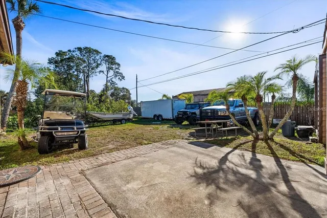 a view of a chairs and tables in the patio