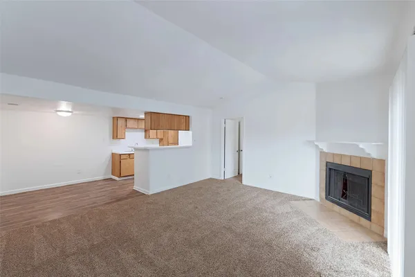 a view of a livingroom with a fireplace