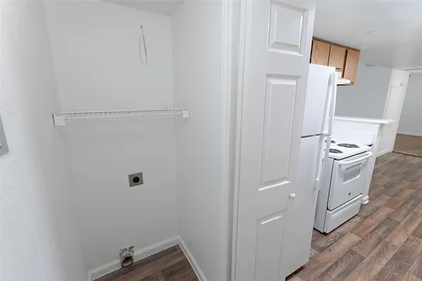 a view of a storage & utility room with closet