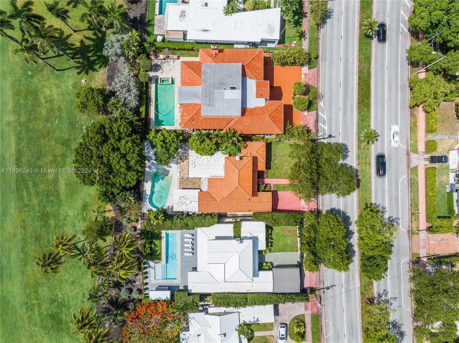 5311 Alton Road Miami Beach, FL 33140 - Photo 19 of 51 an aerial view of a house with a yard and garden