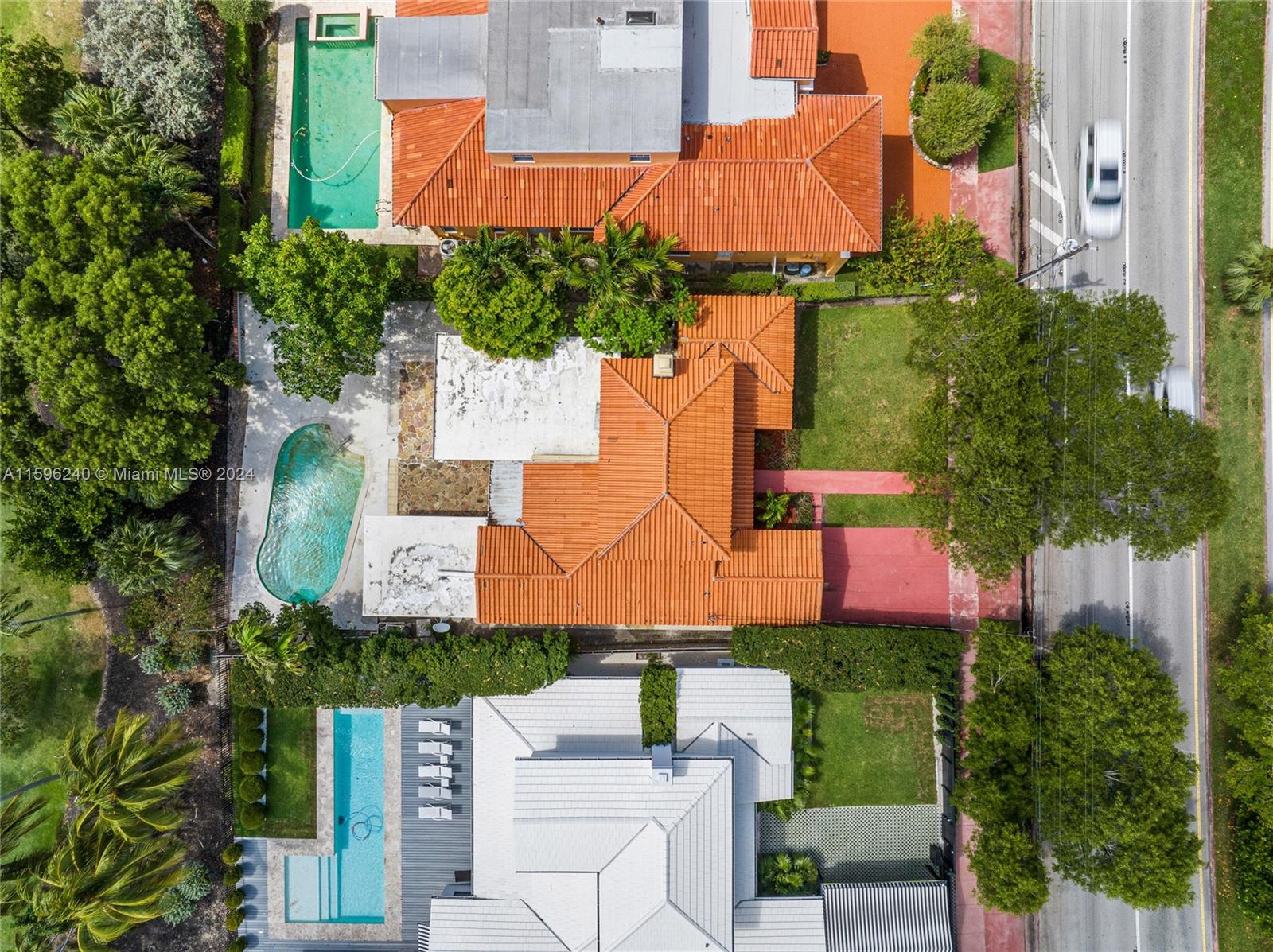 5311 Alton Road Miami Beach, FL 33140 - Photo 20 of 51 an aerial view of a house with yard swimming pool and outdoor seating