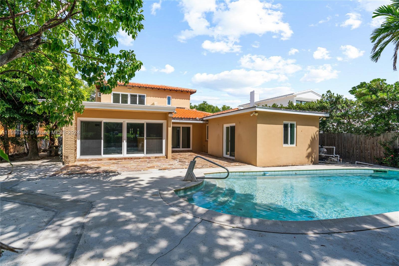 5311 Alton Road Miami Beach, FL 33140 - Photo 21 of 51 a view of a house with a yard and large tree