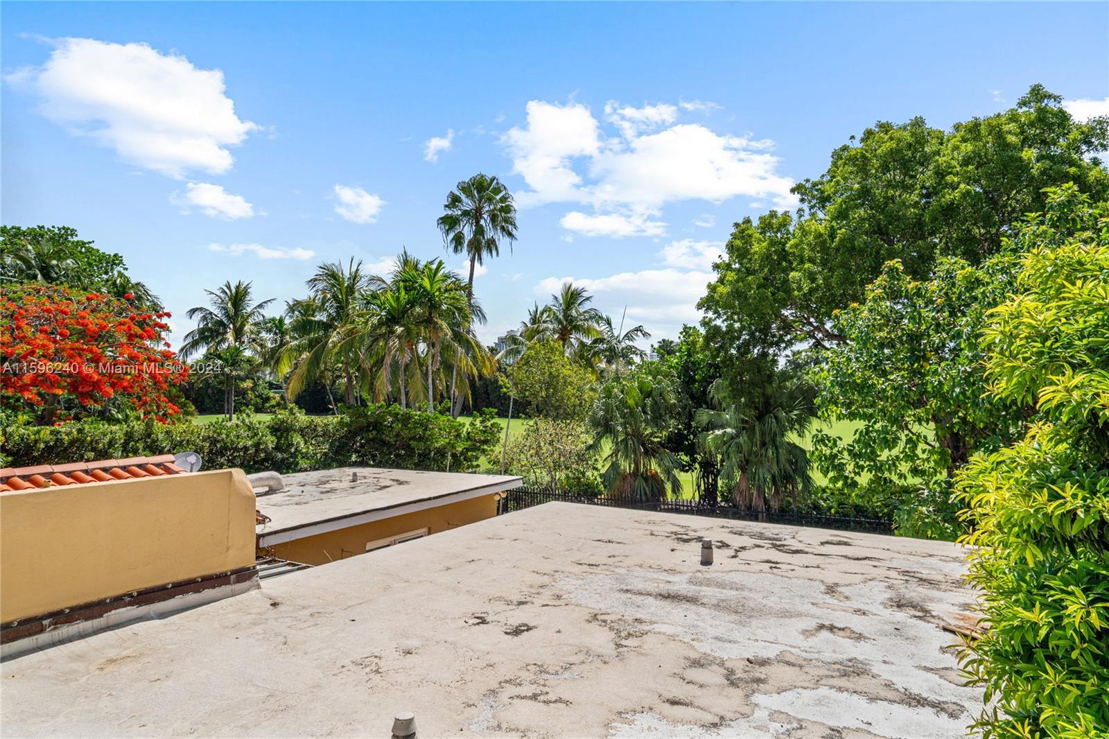 5311 Alton Road Miami Beach, FL 33140 - Photo 49 of 51 a view of a road with a yard