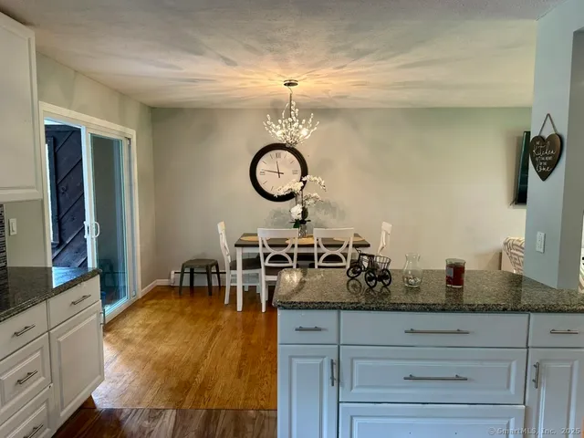 a kitchen with sink cabinets and window
