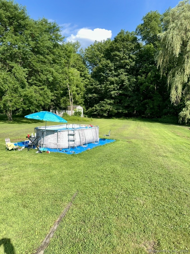 660 East Street South Suffield, CT 06078 - Photo 6 of 39 a view of a house with a big yard