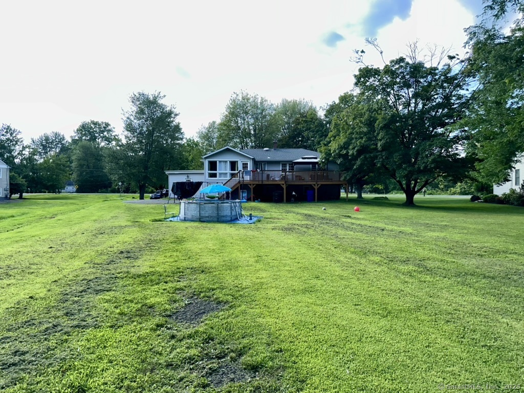 660 East Street South Suffield, CT 06078 - Photo 8 of 39 a view of a house with a yard porch and sitting area