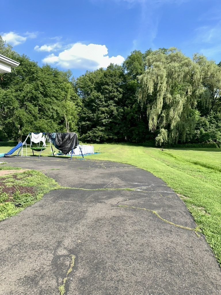 660 East Street South Suffield, CT 06078 - Photo 9 of 39 a view of a garden with a house