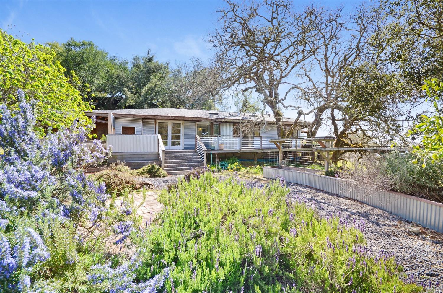 5500 Eagle Ridge Road Penngrove, CA 94951 - Photo 1 of 1 Spacious deck off of the Master bedroom with views to the garden. Love those trees.