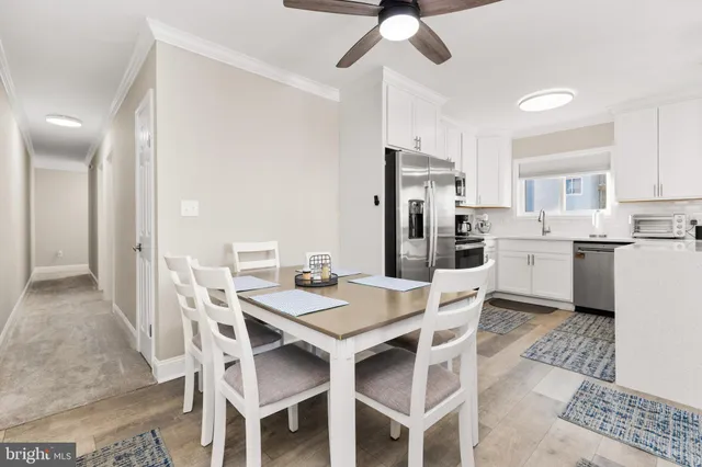 a view of a dining room with furniture