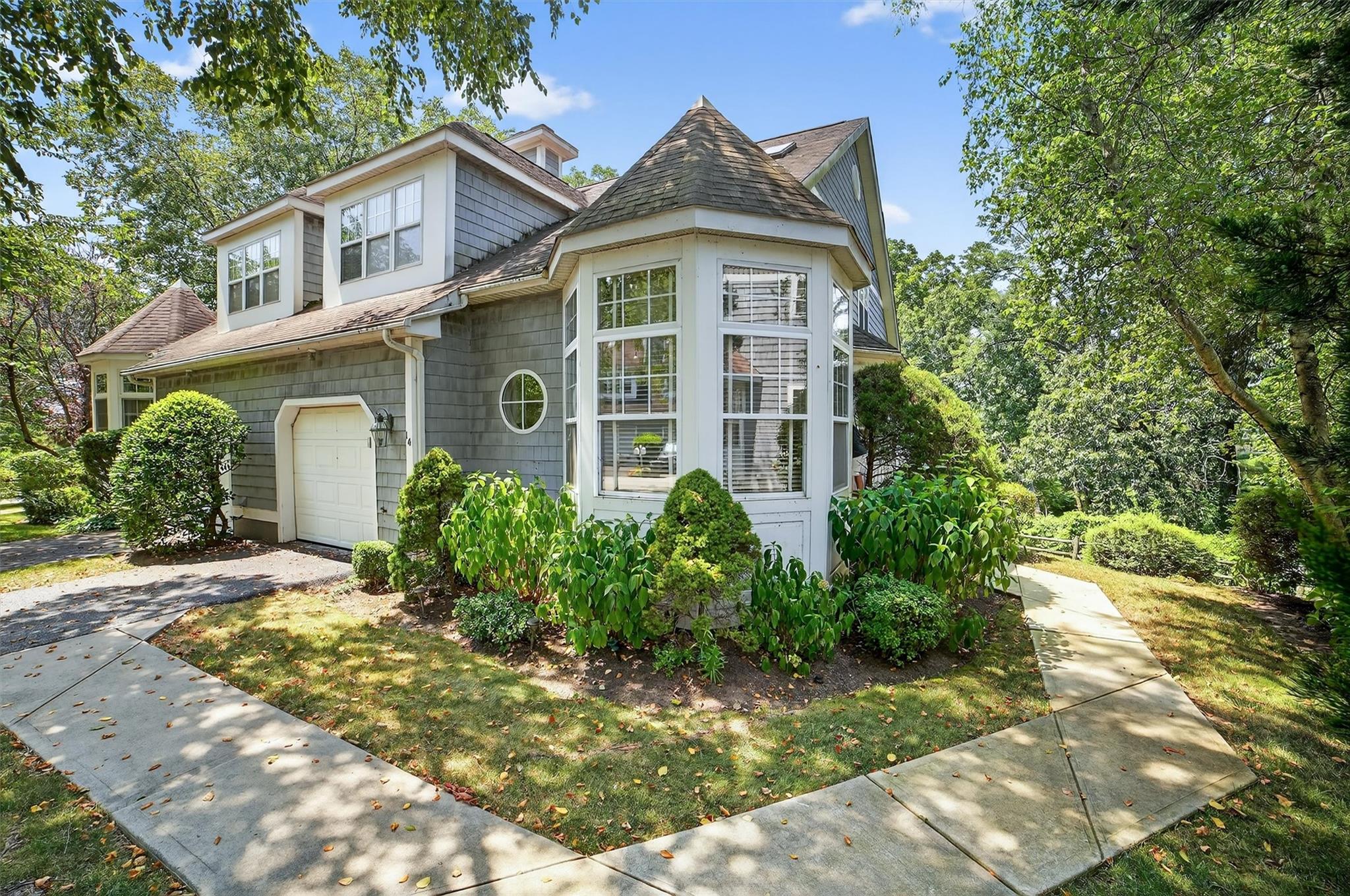 14 High Ridge Road Ossining, NY 10562 - Photo 1 of 1 a front view of a house with garden
